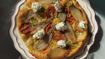 Tarte tatin with caramelized shallot, cherry tomatoes, thyme and ricotta